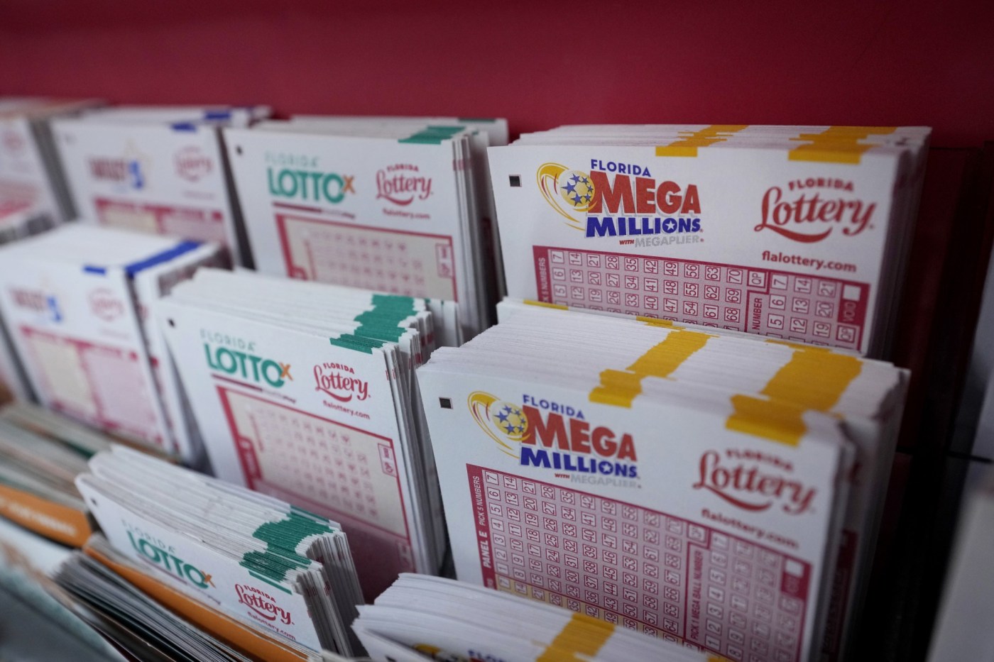 Lottery fever: Mega Millions jackpot hits $893 million, while Powerball grows to $687 million 1 AP23219663684055 1 cesiBX
