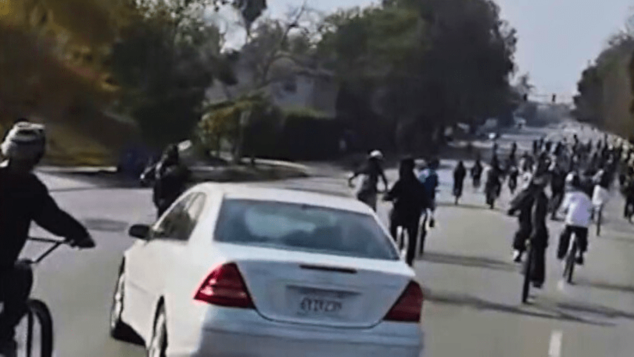 Mercedes-Benz swerves aggressively through crowd of cyclists blocking Los Angeles street 2 Mid City Mercedes 2 oajnMp