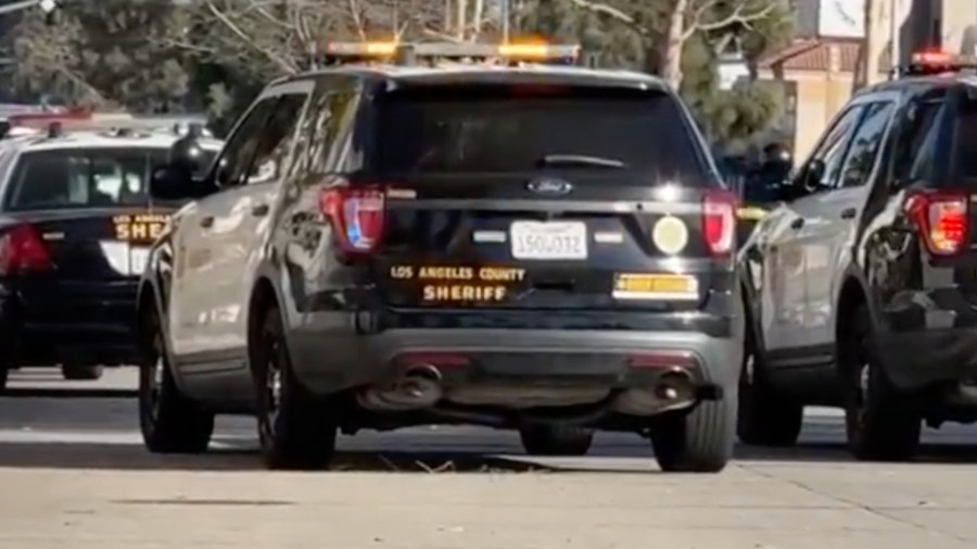 L.A. deputies searching for gunman in shooting that killed 2, injured 5 1 LASD patrol cuisers ABU6bq