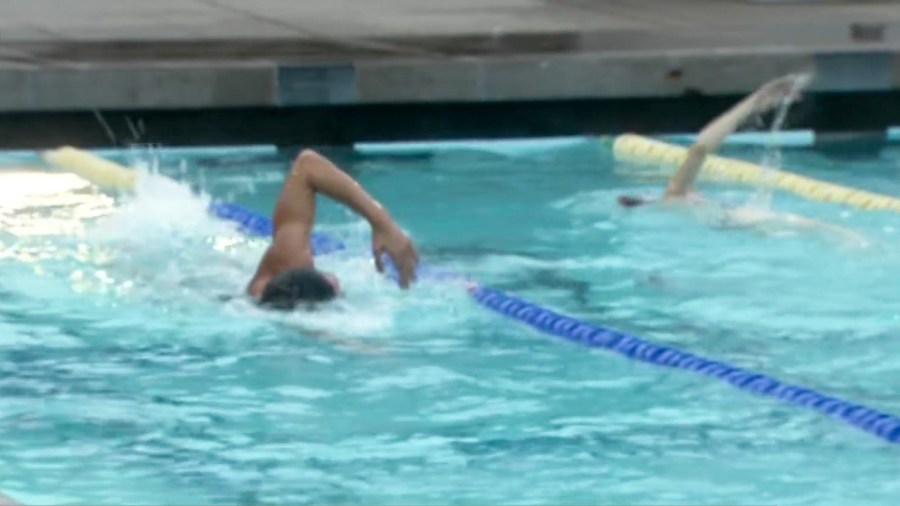swim coach swims to raise money for students menlo park INpXQf